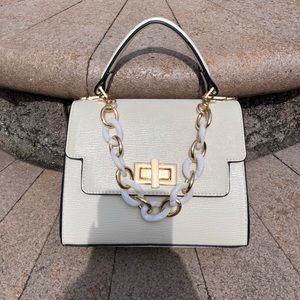 Also white small bag